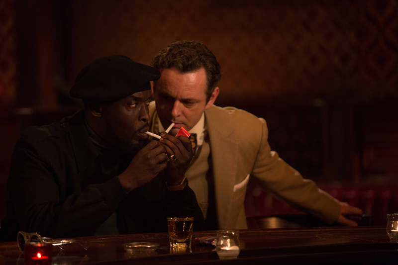 Rock (Michael Kenneth Williams) shares a match with a stranger (Michael Sheen) (Katrina Marcinowski/IFC)
